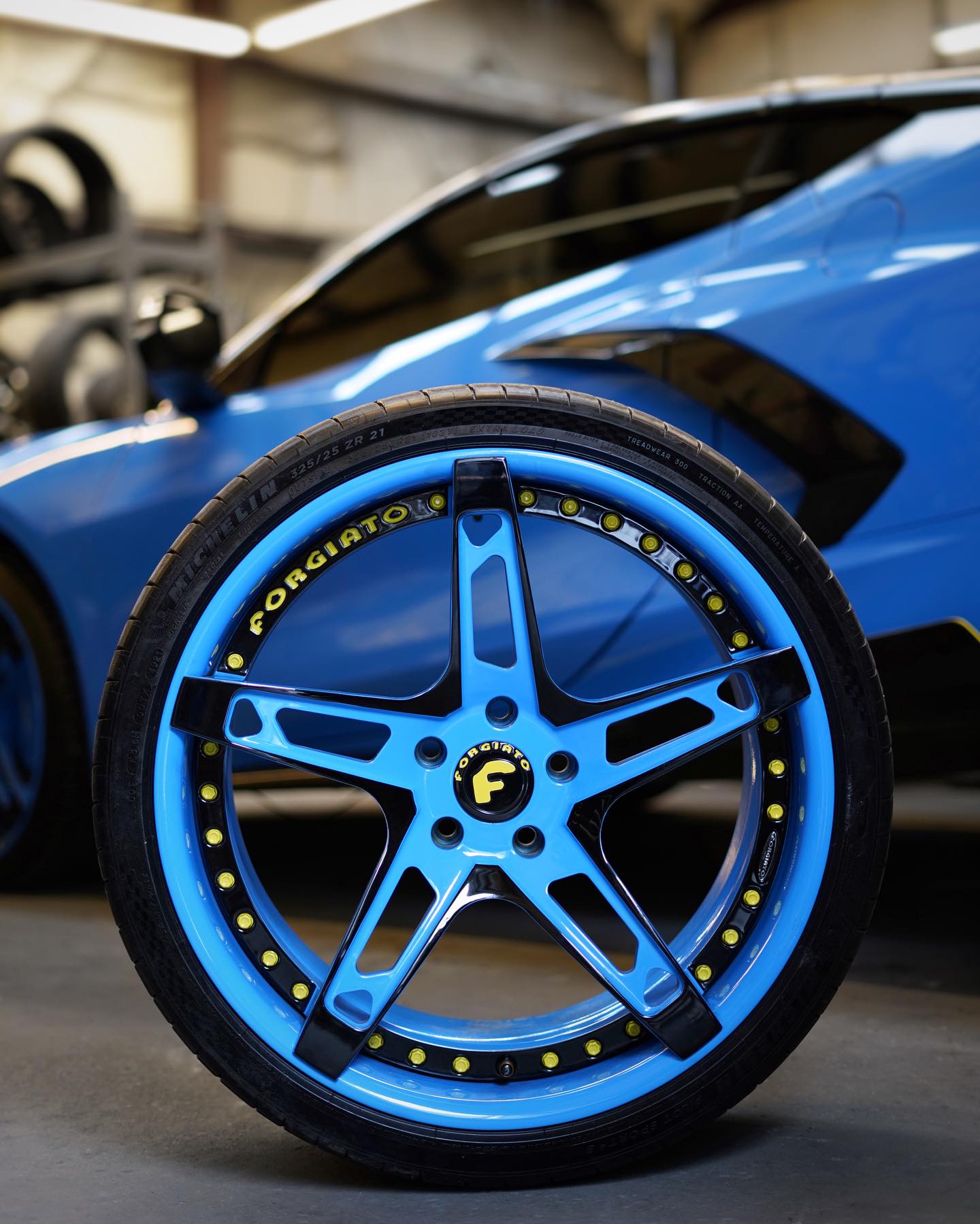 Custom blue Forgiato on blue Corvette